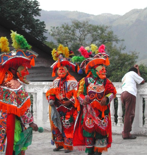 Brightly colored costumes of traditional Guetamalan festivities