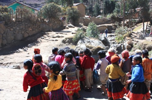 Children playing outside of a school in the Lares Valley of Peru