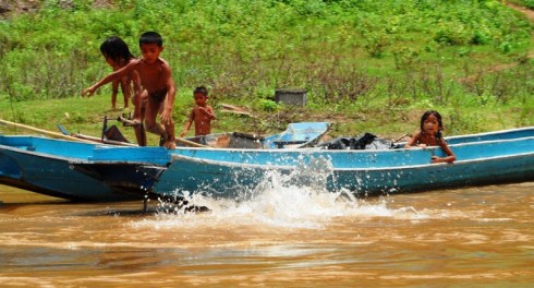 Color photo of children playing on the Mekong