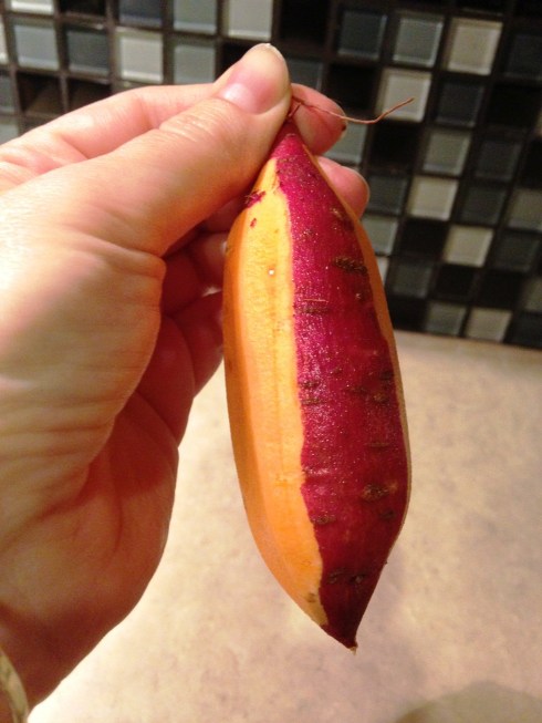 Partially peeled sweet potato